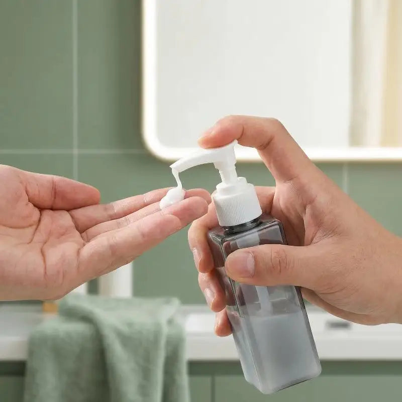 4-in-1 Refillable 60ml Travel Bottle Set with Pump Dispensers